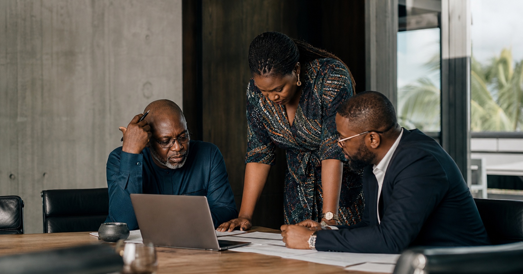Senior African executives working through a decision together